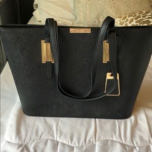 ALDO black and gold purse